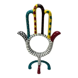 Hand-painted metal hamsa stand coated with enamel