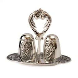 Salt and pepper ANTIQUE shakers with a stand